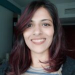 khushali smiling into the camera