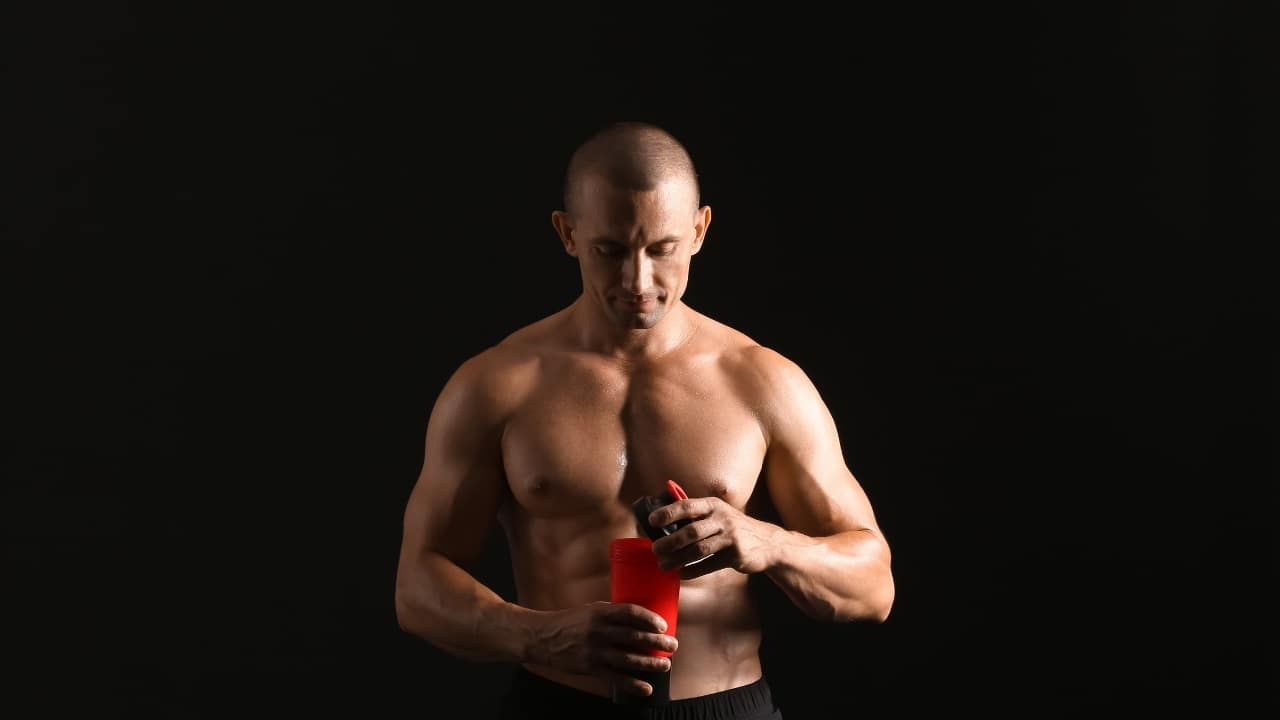 man drinking the best weight gainer for skinny guys