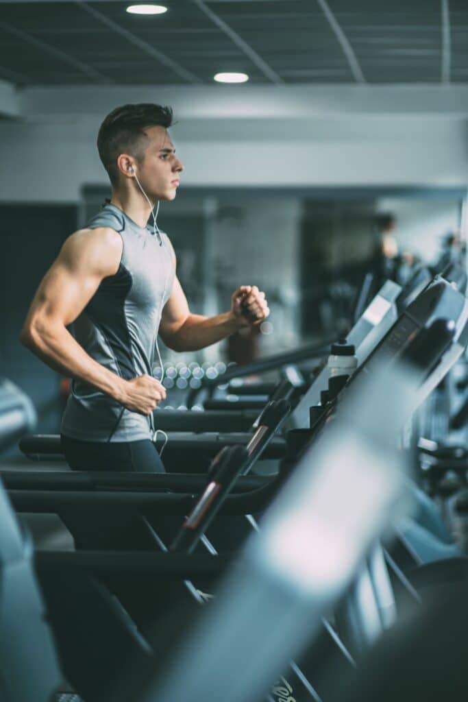 man working out on the best manual treadmill