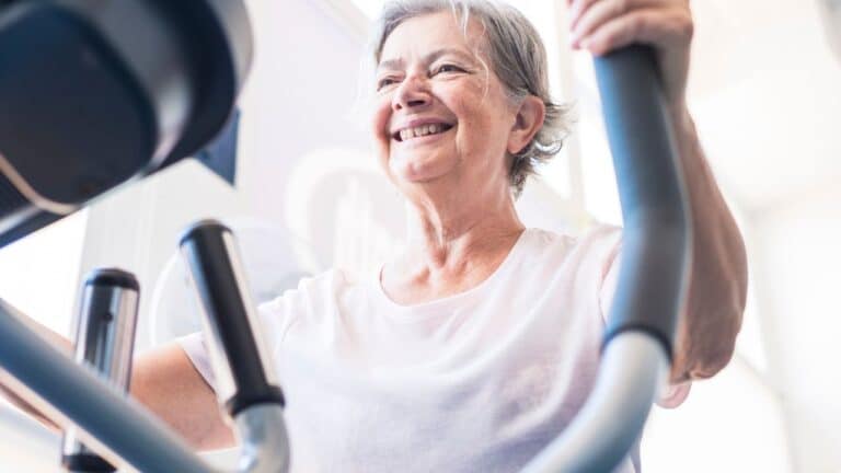 elderly women working out on the best seated elliptical for seniors